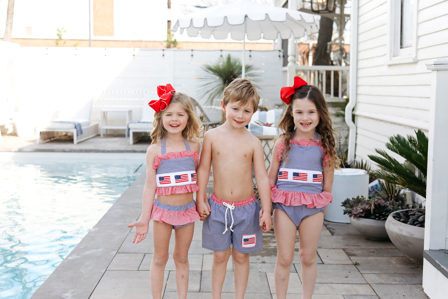 Navy And Red Gingham Smocked Flag Swim Trunks