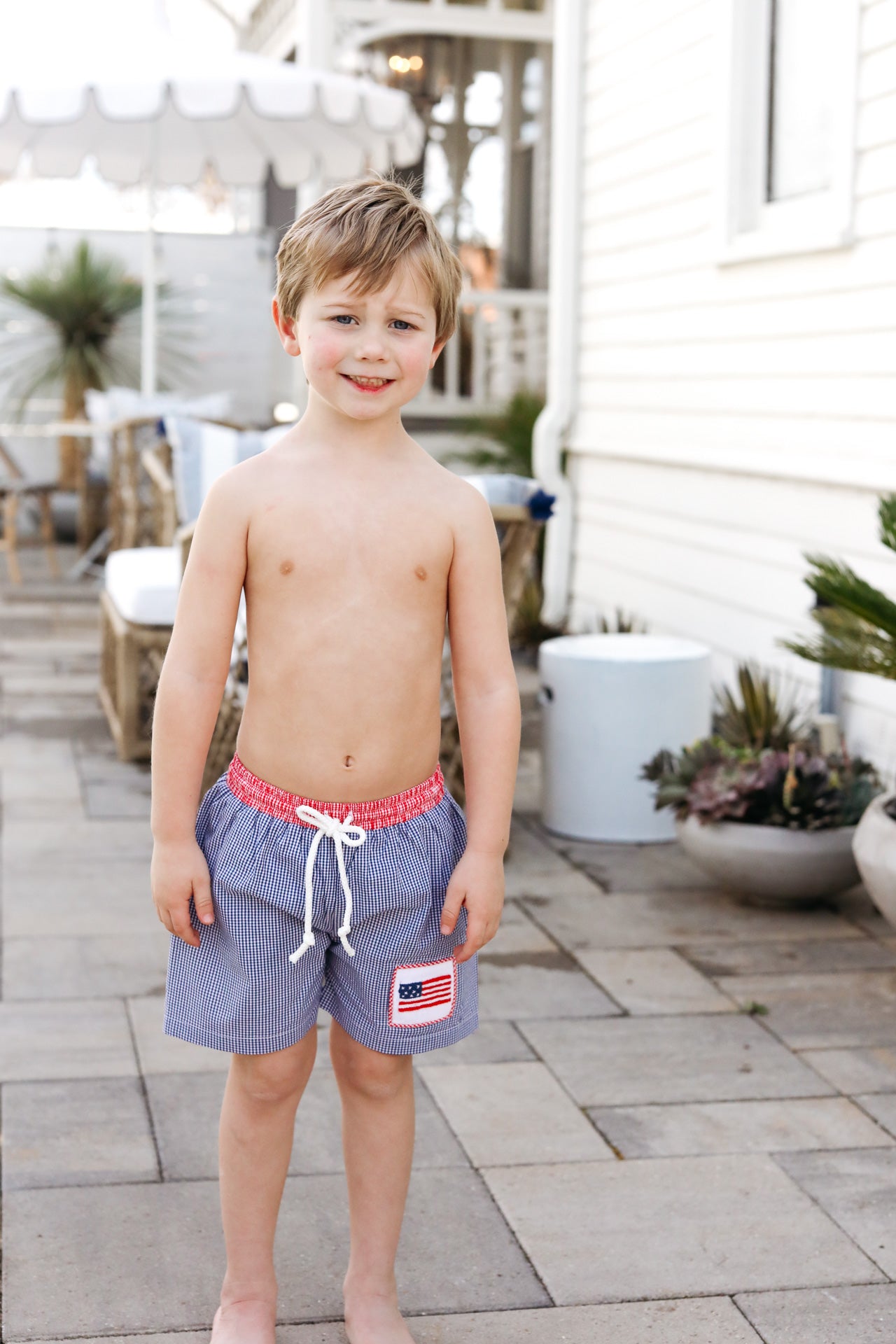 Navy And Red Gingham Smocked Flag Swim Trunks